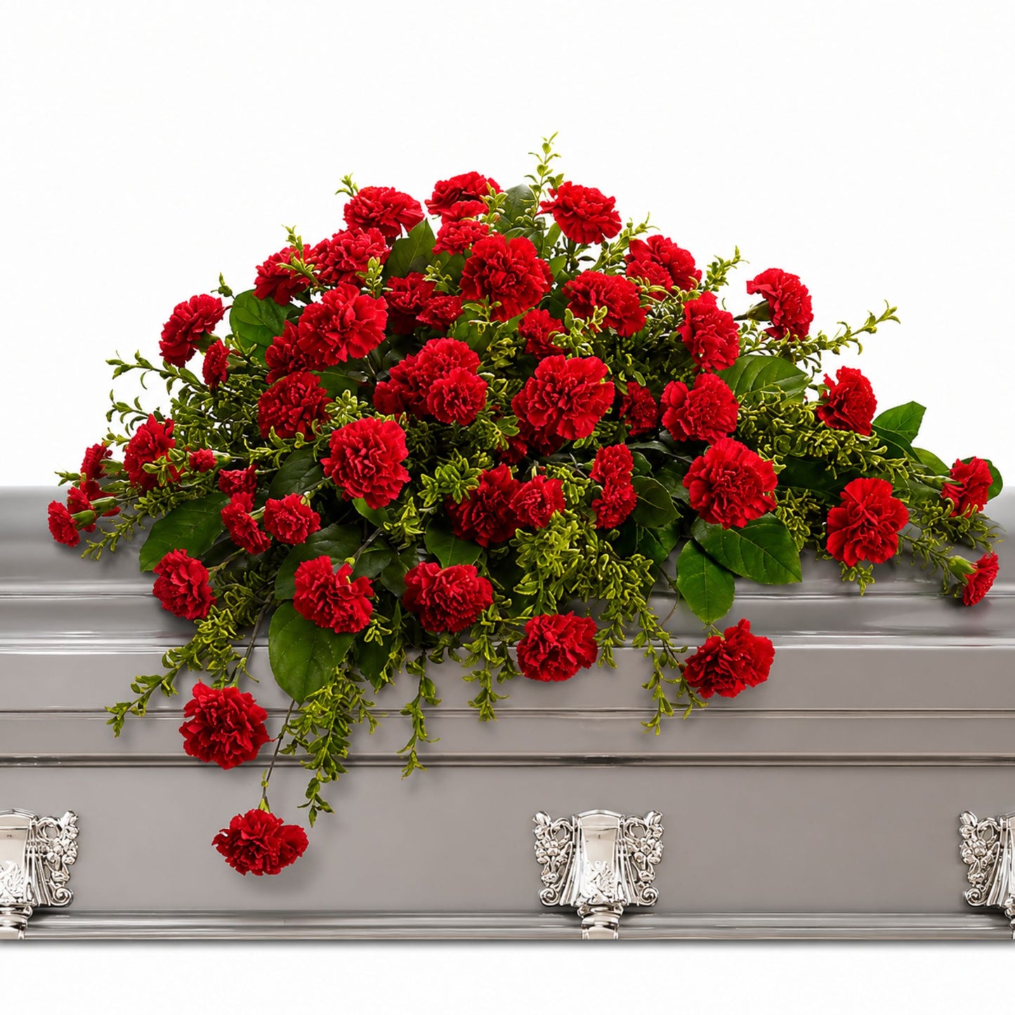 Red carnation casket spray with boxwood greenery