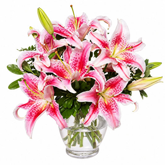 Fragrant pink Stargazer lilies and mixed greenery in a clear glass vase by Karen's Floral Expression, Bolingbrook
