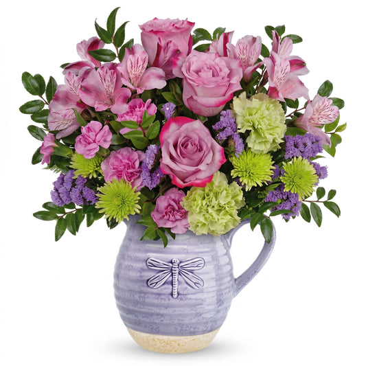 Whimsical Dragonfly Bouquet – Lavender roses, pink alstroemeria and carnations in a lavender ceramic dragonfly pitcher by Karen's Floral Expression, Bolingbrook