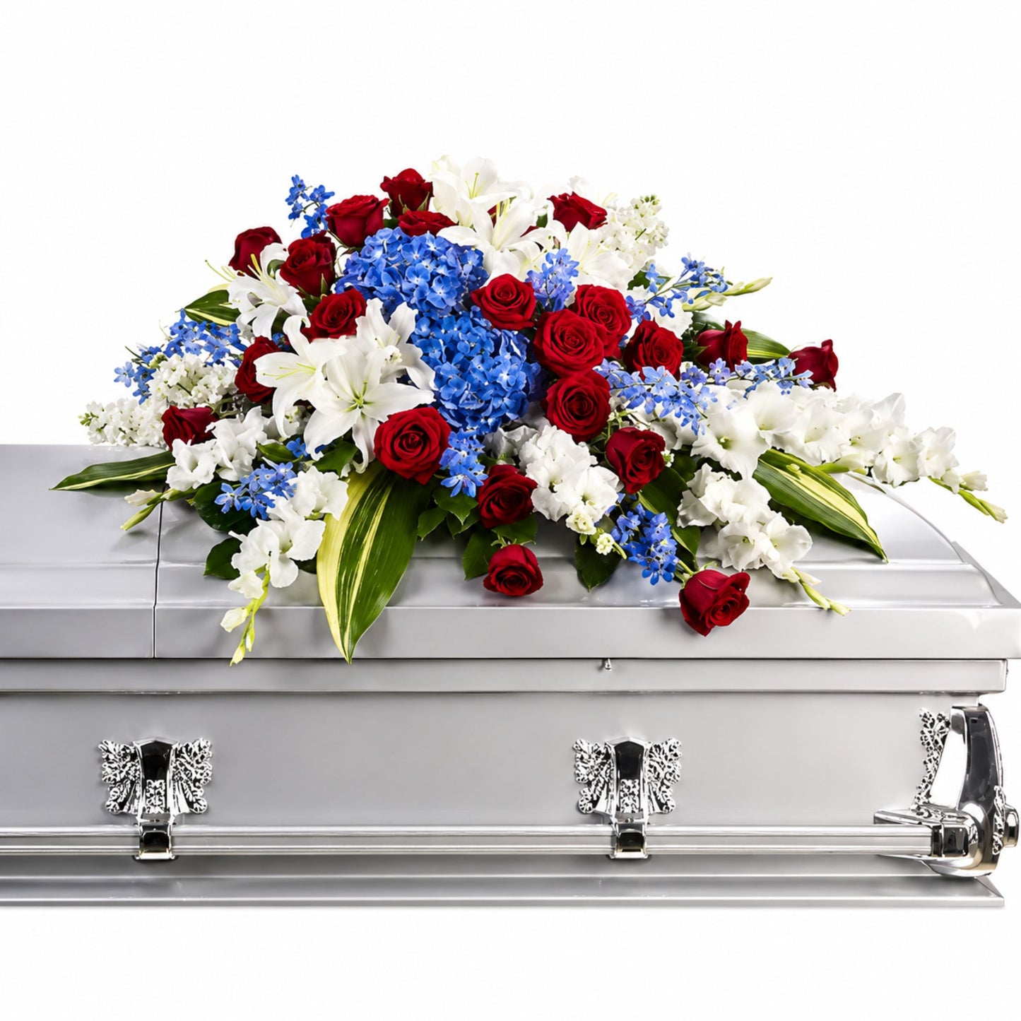 Red white and blue casket spray with roses lilies and hydrangea