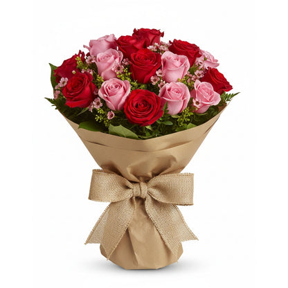 Red and pink roses wrapped bouquet with burlap bow — Karen's Floral Expressions, Bolingbrook, IL