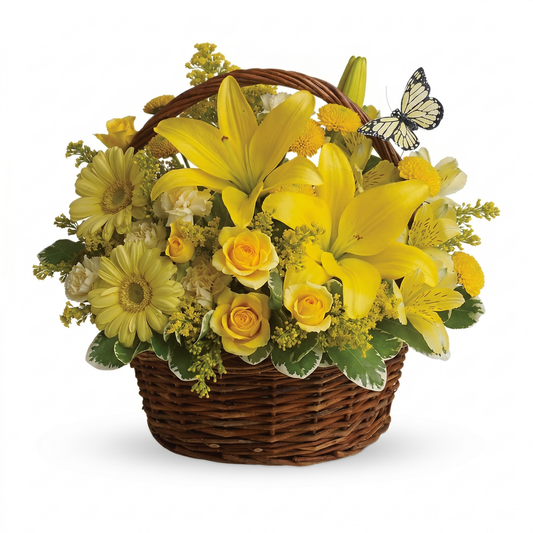 Yellow flower basket arrangement with lilies, roses, gerbera daisies and butterfly accent for Administrative Professionals Week