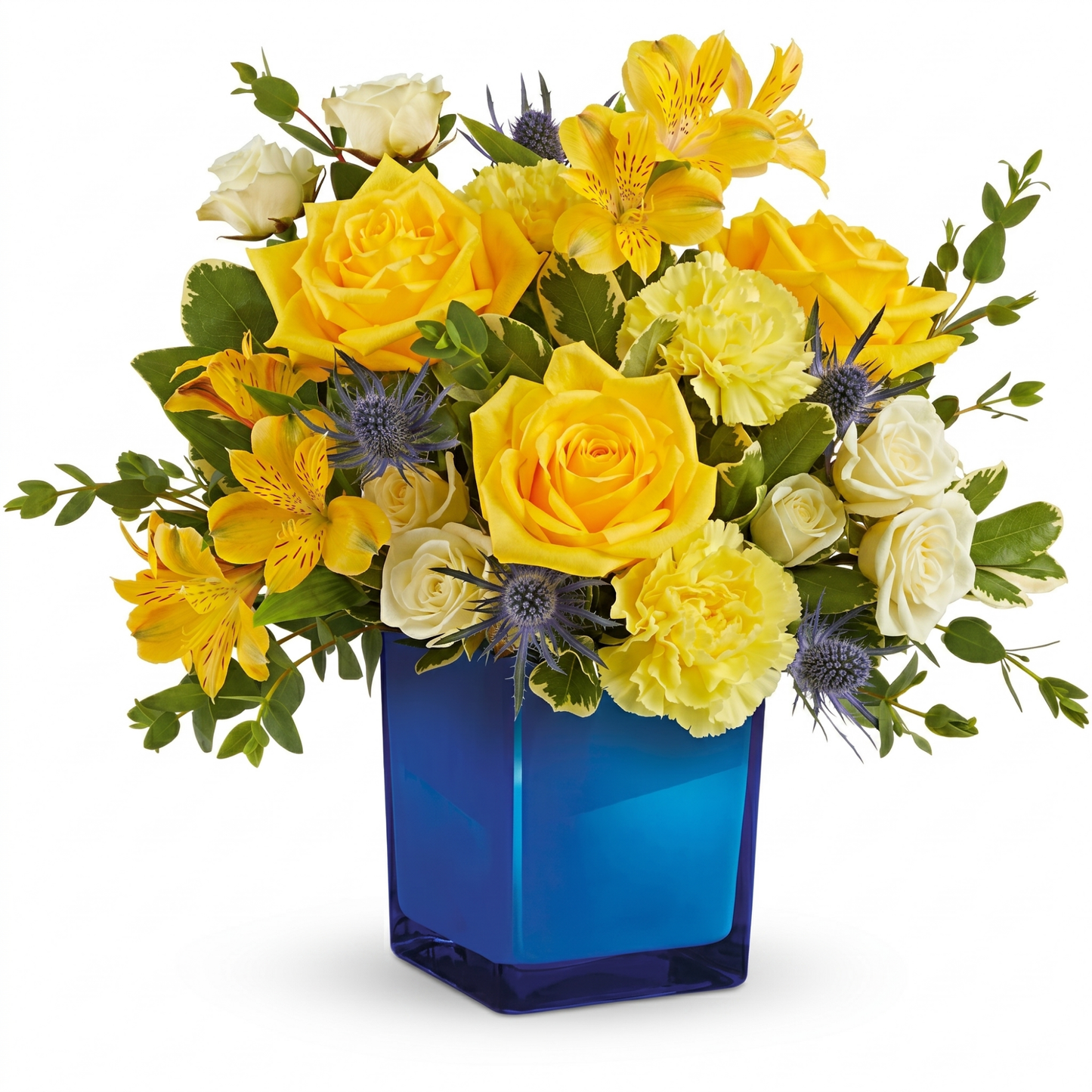 Golden blue bouquet with yellow roses, alstroemeria and blue thistle in cobalt blue glass vase
