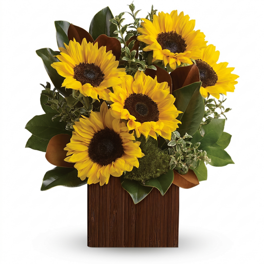 You're golden sunflower bouquet with gerbera daisies and magnolia leaves in wooden cube vase