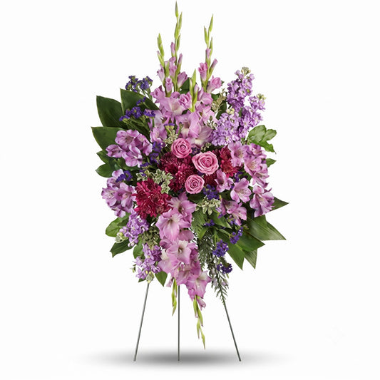 Lavender gladiolus and purple alstroemeria standing spray on easel