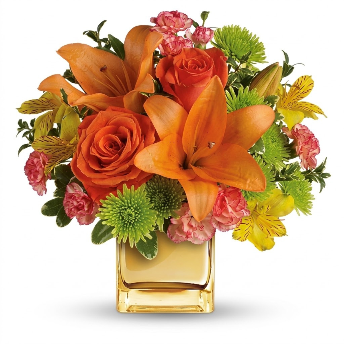 A vibrant floral arrangement featuring orange lilies, orange and pink roses, green mums, and yellow flowers in a square gold glass vase, set against a plain white background.